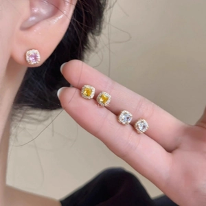 Three pairs of elegant square halo stud earrings in pink, yellow, and clear crystals