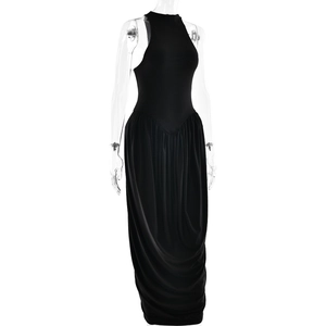 Detail view of the elegant black halter neck dress with sophisticated ruched pleats