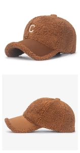 Detail of caramel faux shearling baseball cap with suede brim and white letter C embroidery
