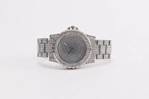 Detailed view of silver crystal watch with rhinestone-encrusted dial and link bracelet