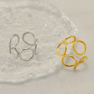 Bague ajustable multi-cercles évidée en or et argent avec une surface texturée