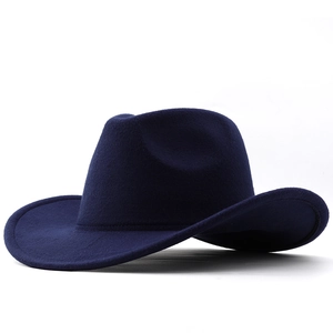 Detail view of navy blue wool felt cowboy hat with classic curved brim and structured crown