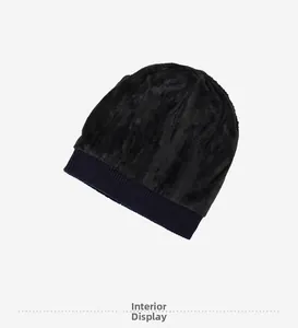 Close-up of soft black fleece lining and ribbed edge of the thermal winter knit hat
