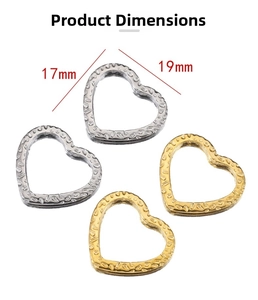 Macro detail of heart hollow pendants with engraved texture in gold and silver finish
