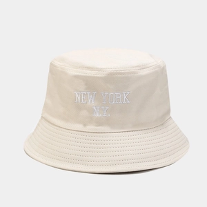 Detail of cream cotton bucket hat with white New York N.Y. 3D embroidery and stitched brim
