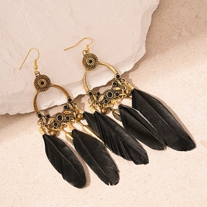 Bohemian vintage gold earrings with black feathers and hollow round pendants