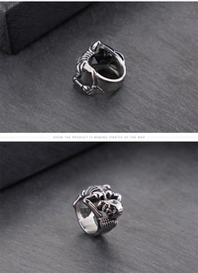 Macro detail of a punk skull ring with rib cage band made of silver stainless steel