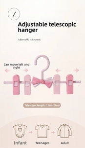 Pink adjustable children hanger with non-slip clips for baby clothes 11-27cm range