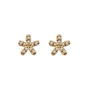 Minimalist gold star earrings for women with tiny clear cubic zirconia pavé stones