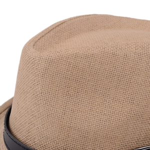 Close-up of the woven khaki straw hat texture and black leather band details