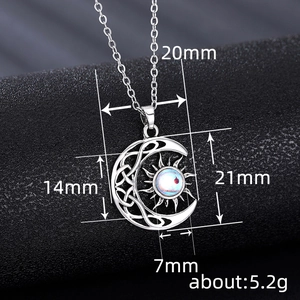 Vintage sun and moon necklace with iridescent moonstone and celtic knot detailing