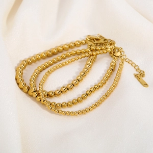 Three-piece set of 18K gold plated stainless steel bead bracelets with adjustable clasps