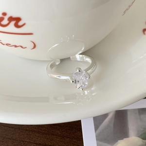 Elegant 925 sterling silver ring featuring a rectangular zircon stone and four-prong setting