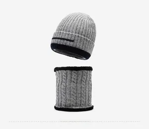 Detail view of light grey knit hat and neck warmer set with warm plush fleece lining