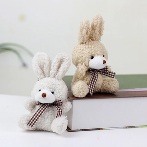 Cute white and beige plush bunny toys with checkered bows made of soft curly fleece fabric