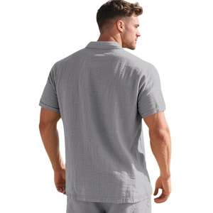 Back view of a men's gray linen polo shirt featuring breathable crinkle fabric texture