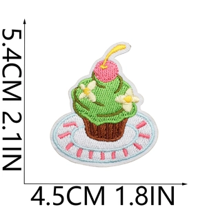 Embroidered tiramisu cupcake patch in green and pink, measuring 5.4cm by 4.5cm