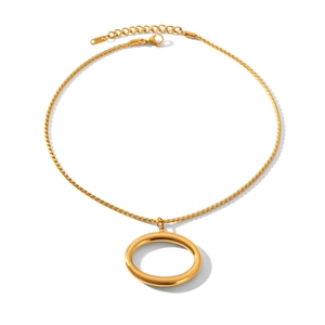 Detail showing high-polished gold oval pendant on a twisted rope chain with lobster clasp