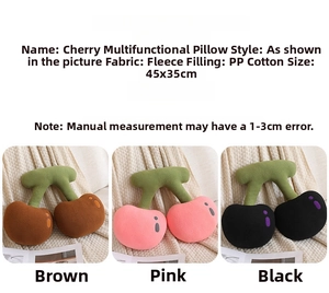 Detail view of plush cherry pillow in polar fleece fabric measuring 45x35cm size