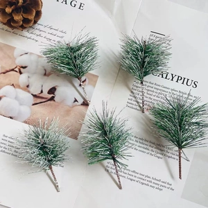 Five pieces of artificial green pine branches with silver accents for DIY Christmas wreaths