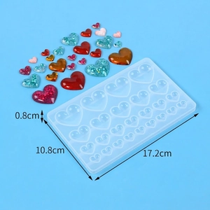 Macro detail of 18-cavity heart silicone mold for resin art with dimensions and finished samples