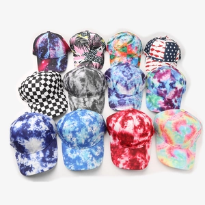 Collection of 3D printed baseball caps with tie-dye, galaxy, and floral patterns
