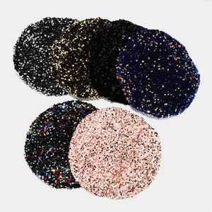 Collection of sequined beret hats for women in various colors on white background