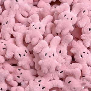 Cute pink plush rabbit keychains stacked together for student backpack accessories