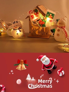 Détail d'une guirlande LED de Noël avec Père Noël et bonhomme de neige pour la fête