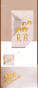 Detail of vintage titanium steel gold earrings with natural freshwater pearls