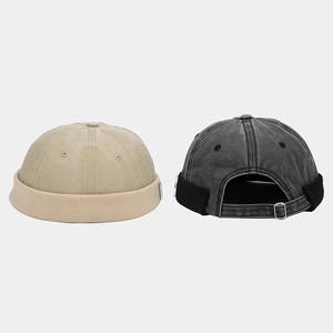 Retro cotton docker hats in beige and washed black with adjustable metal buckles