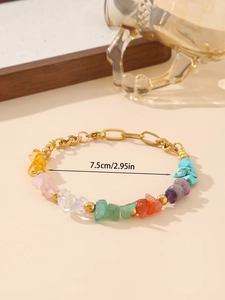 Detail showing the 7.5cm length of colorful natural stone beads on a gold chain bracelet