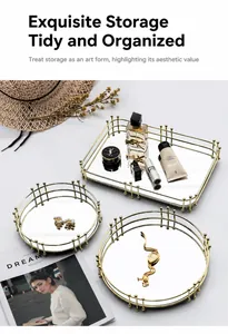 Detailed view of luxury gold metal mirrored trays with modern geometric wire frames