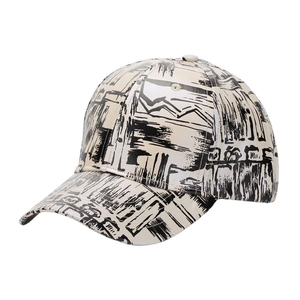 Detail shot of graffiti print patterns on a cream PU leather baseball cap surface