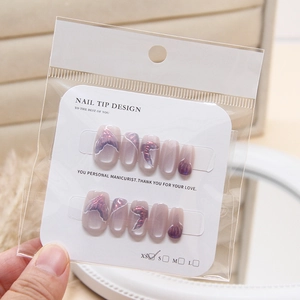 Handmade cat eye press-on nails featuring purple mermaid scale design in size XS
