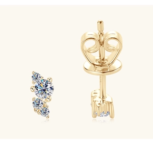 Macro detail of gold moissanite cluster earrings showing 4 stones and S925 silver finish