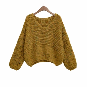 Chunky V-neck knit sweater in mustard yellow with colorful flecks and balloon sleeves