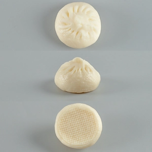 Realistic PVC steamed bun food model showing top, side and bottom textured views