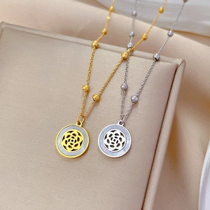 Minimalist titanium steel camellia shell necklace set in gold and silver finishes