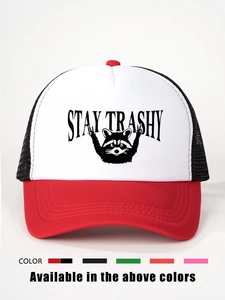 Detail of the Stay Trashy raccoon print on a red and white mesh trucker cap