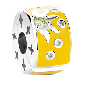 Macro shot of 925 silver charm with yellow enamel sun and star cubic zirconia inlay