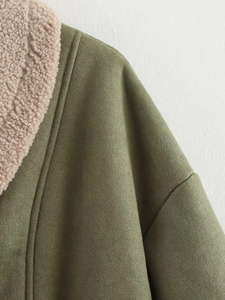 Detail shot of olive green faux suede jacket showing contrast beige faux shearling collar