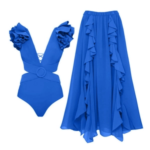 Detail of Klein blue swimsuit with 3D floral ruffles and matching tiered maxi skirt