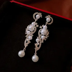 Silver long tassel earrings with pearls and rhinestones in vintage French style