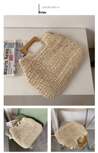 Detail of hand-woven straw tote with elegant square wooden handle for beach vacations