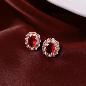 18K gold plated oval stud earrings with red crystal and halo of clear stones