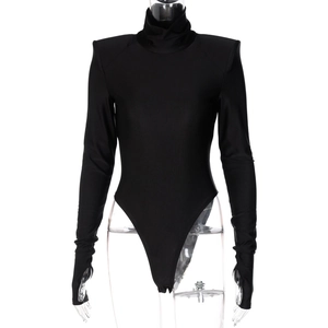 Detail of black mock neck bodysuit with padded shoulders and thumbhole sleeve cuffs