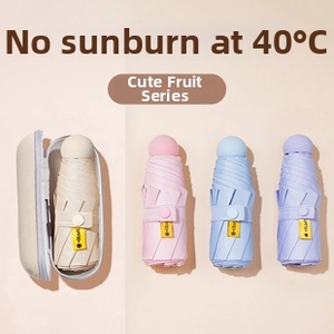 Mini capsule umbrella in macaron colors with compact hard case and UPF50+ sun protection