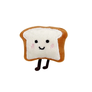 Cute plush toast bread hair tie with black legs and embroidery on white background