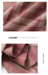Detail of soft pink and beige plaid scarf showing high-quality breathable fabric texture